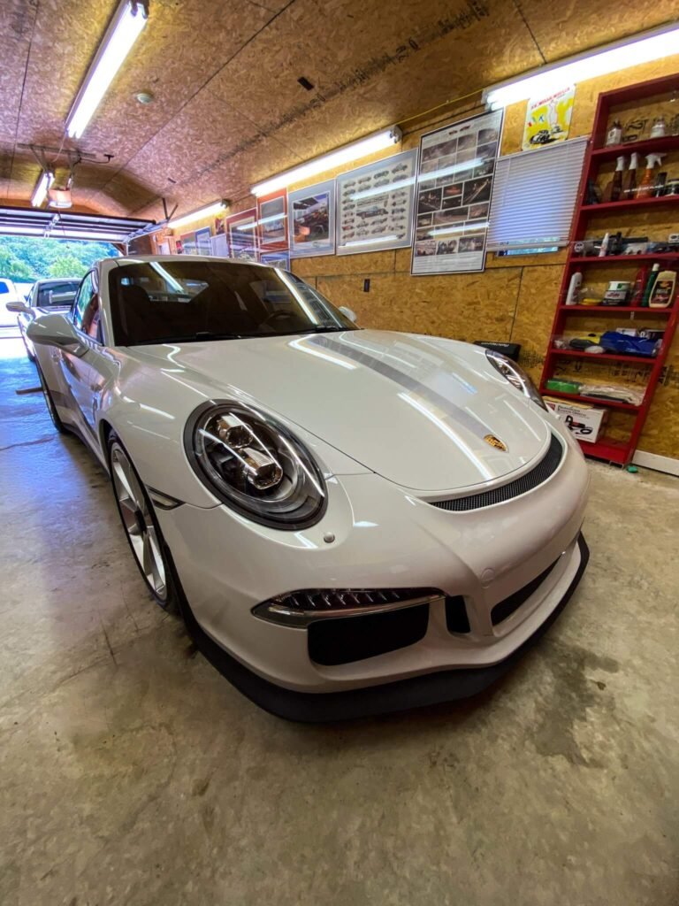 front angle of white Porsche