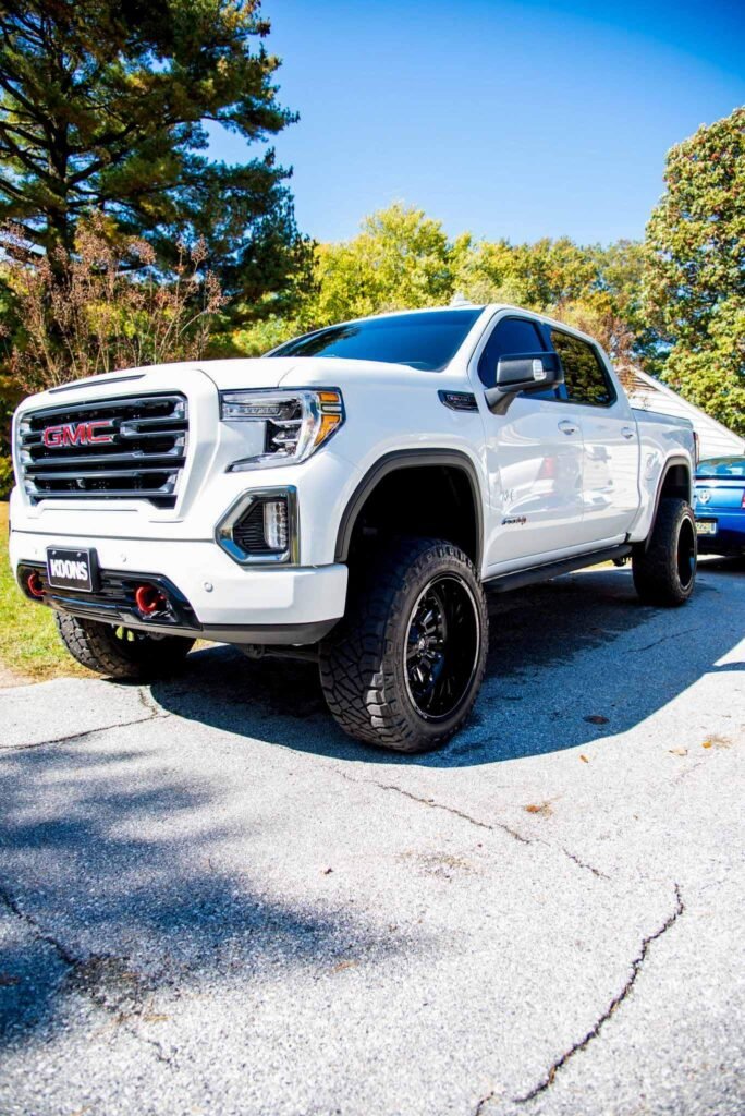 White shiny GMC Sierra in a driveway loacted in tampa bay