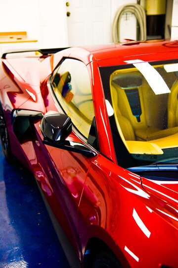 Shiny red ceramic-coated Corvette