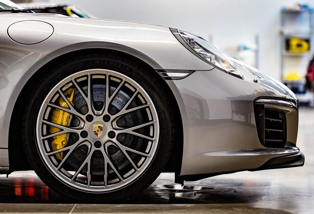 Side of Profile Grey porsche, close up on wheel